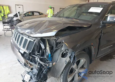 2014 Jeep Grand Cherokee Overland из США, поврежденный, VIN 1C4RJFCG7EC182317